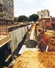 Work in progress: efforts are being made to rebuild key routes, but transporting materials is especially hard